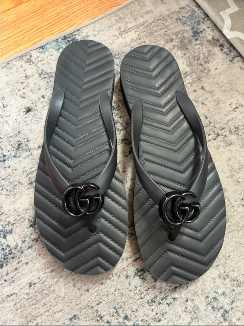 Gucci Black GG Marmot Chevron Flip Flops